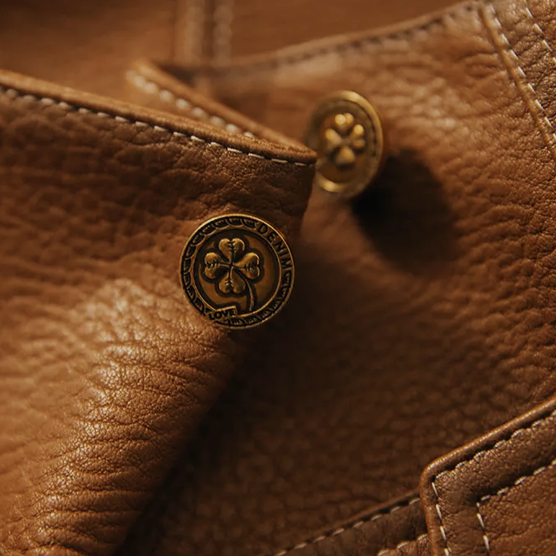 Women's brown leather jacket with collar and front pockets