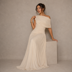 Beige sheer maxi dress showing the ruched detailing, side view