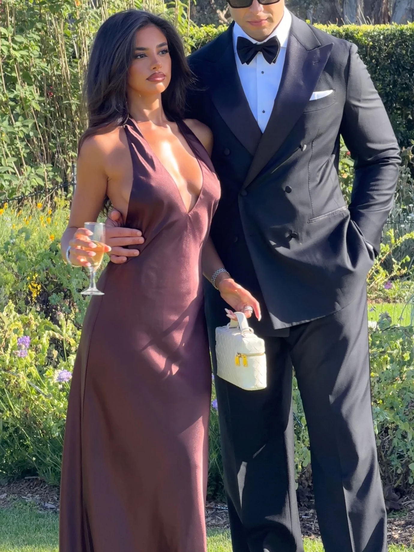 Brown satin halter maxi dress with plunging neckline, close front view