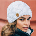 White knitted beanie for winter