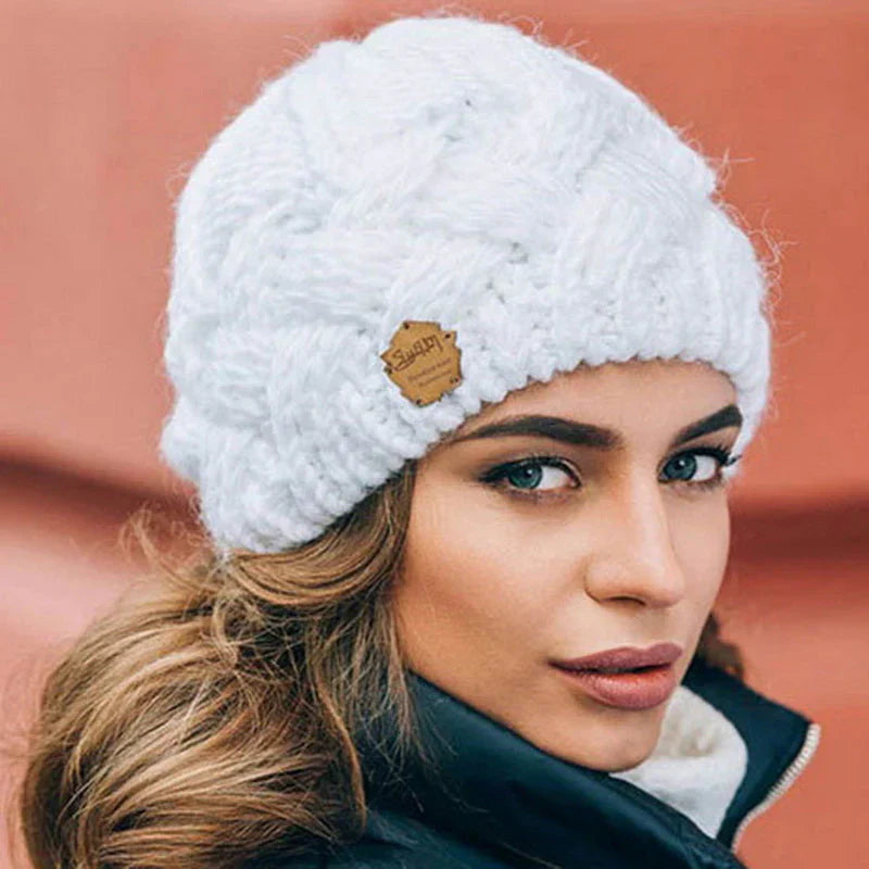 White knitted beanie for winter