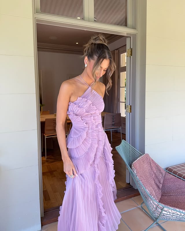 Lavender halter maxi dress styled in a doorway setting