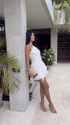 White halter ruffle mini dress with cascading ruffle detailing
