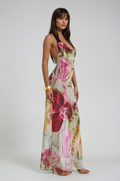 Pink floral maxi dress shown with its hand-beaded embellishment.