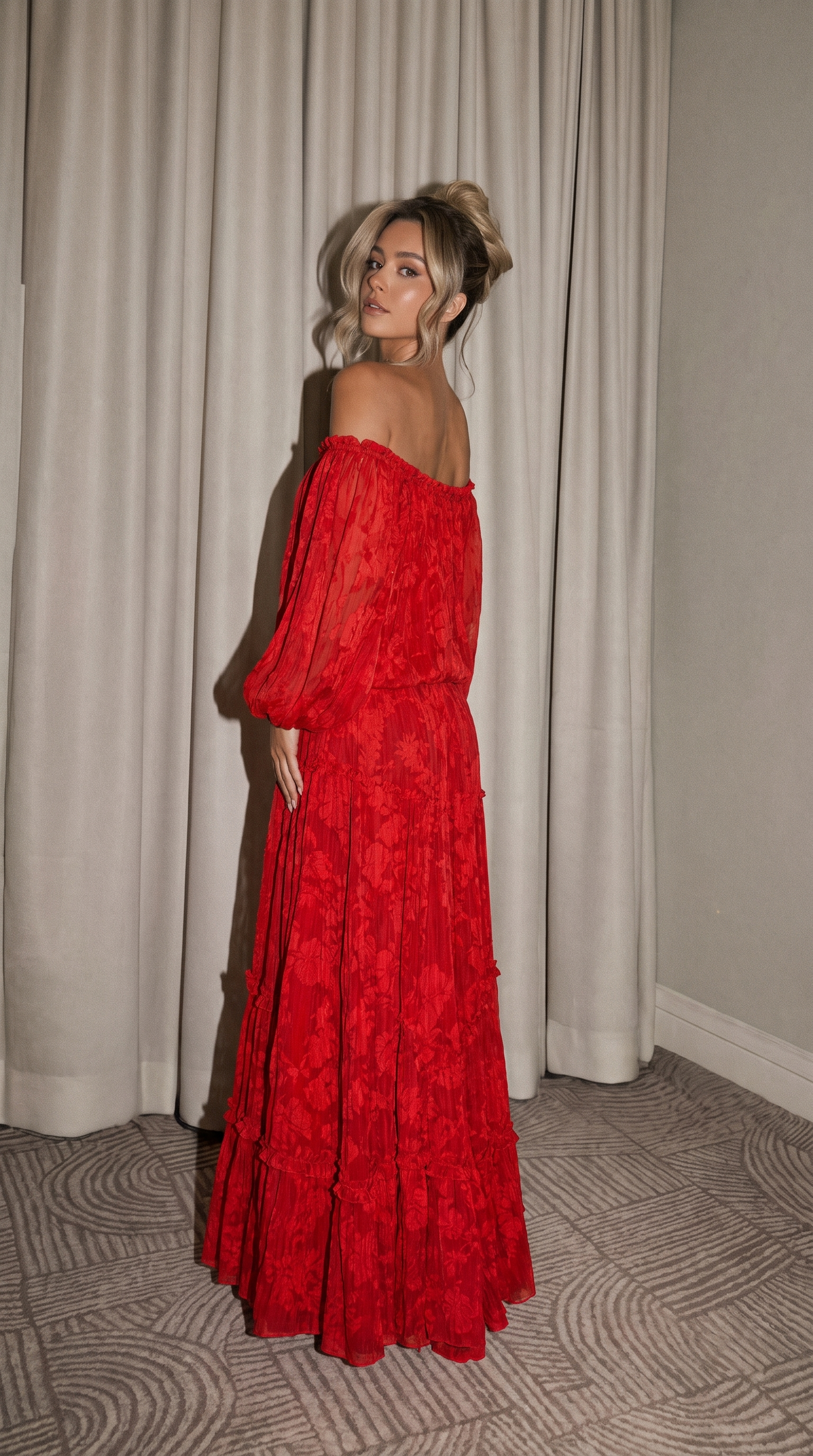 Red off-shoulder lace maxi dress with long sleeves, back view against curtains