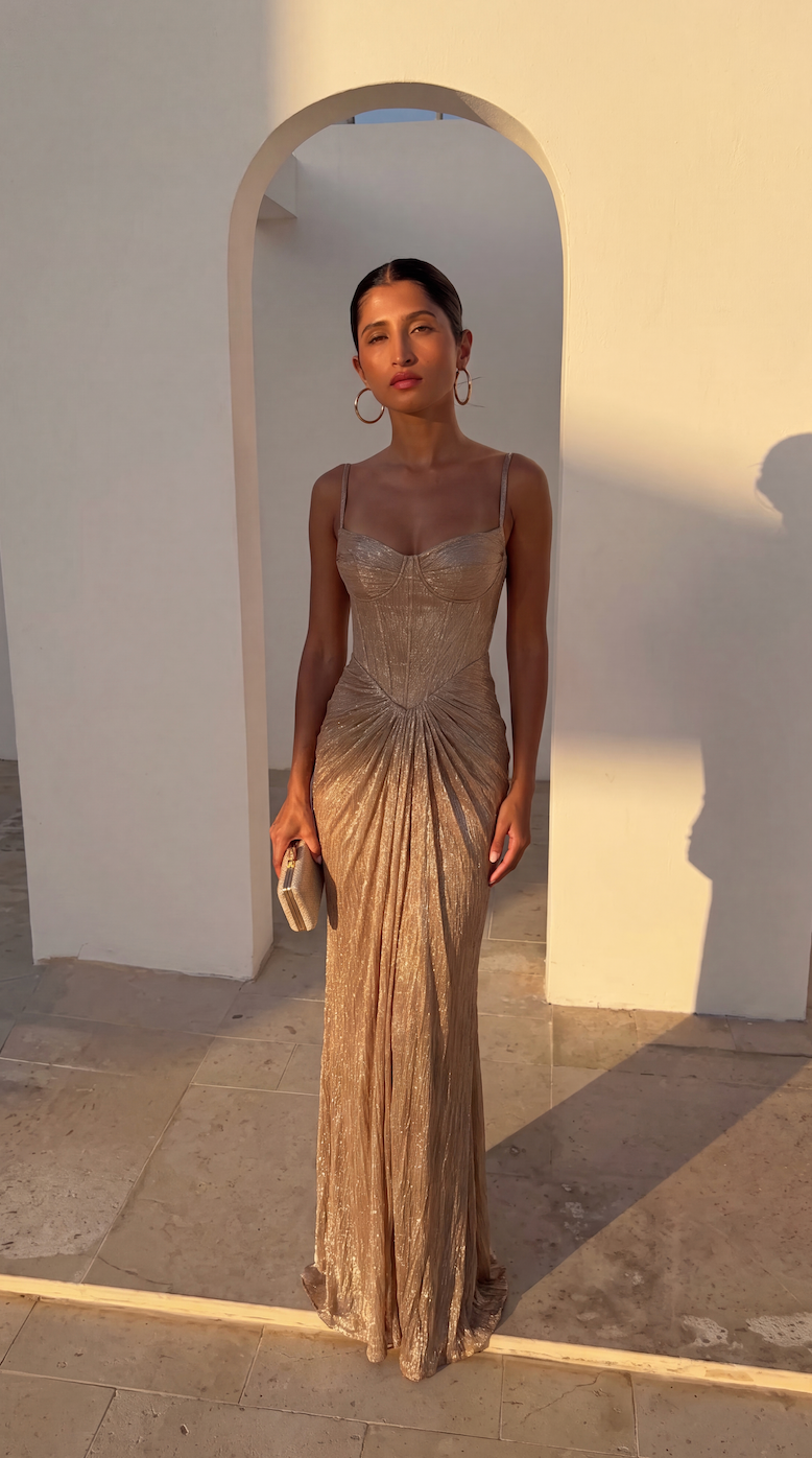 Front view of the gold corset maxi dress featuring sweetheart neckline.