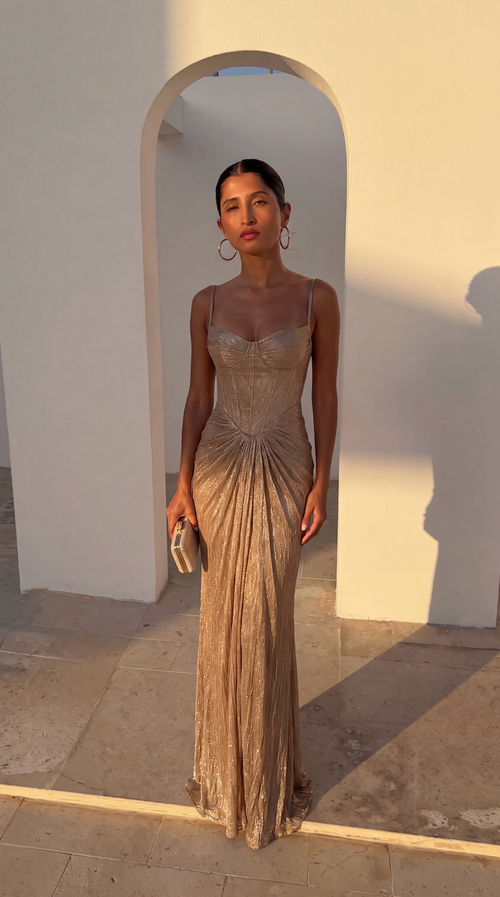 Front view of the gold corset maxi dress featuring sweetheart neckline.