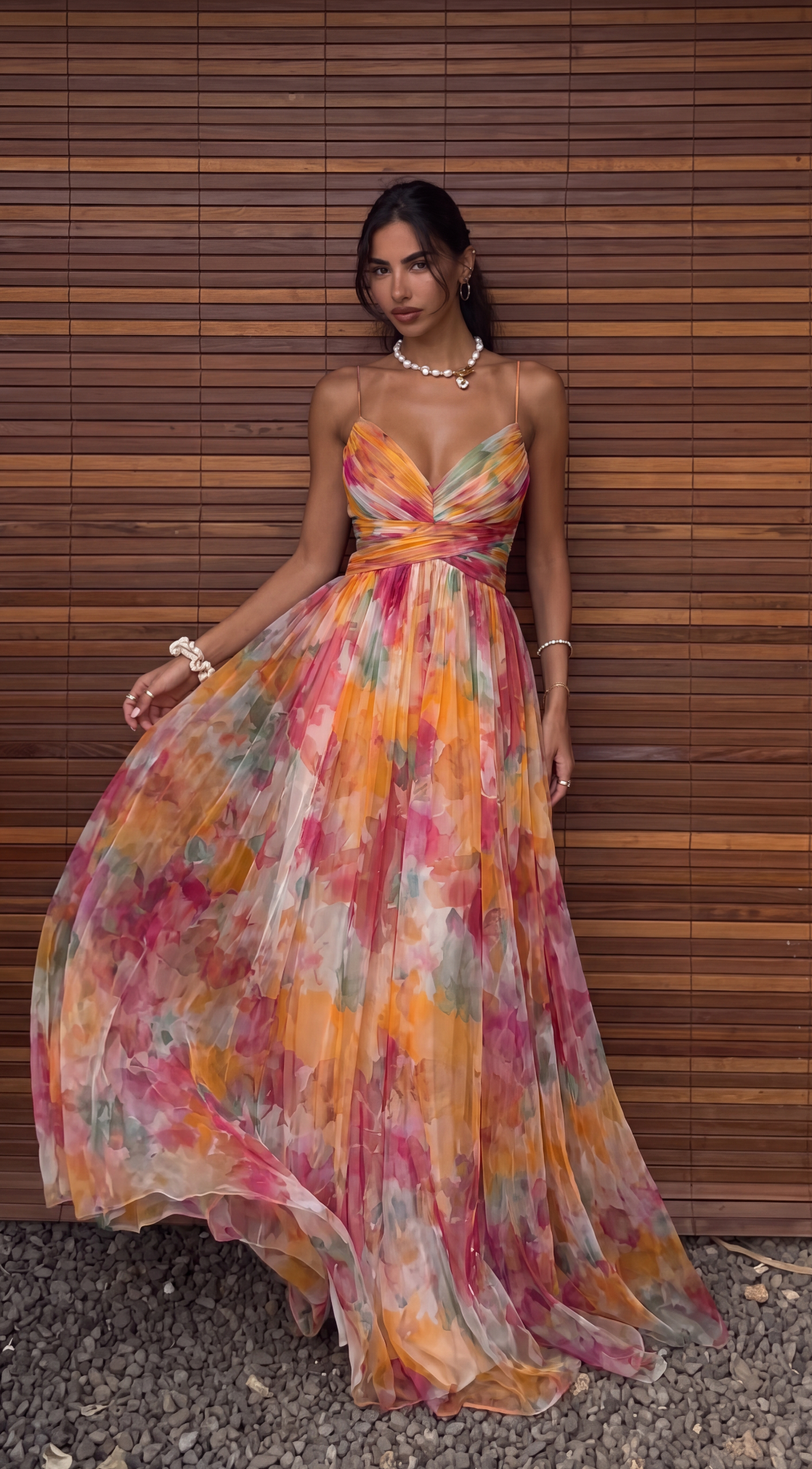 Orange floral maxi dress worn, showing the fit and overall silhouette.