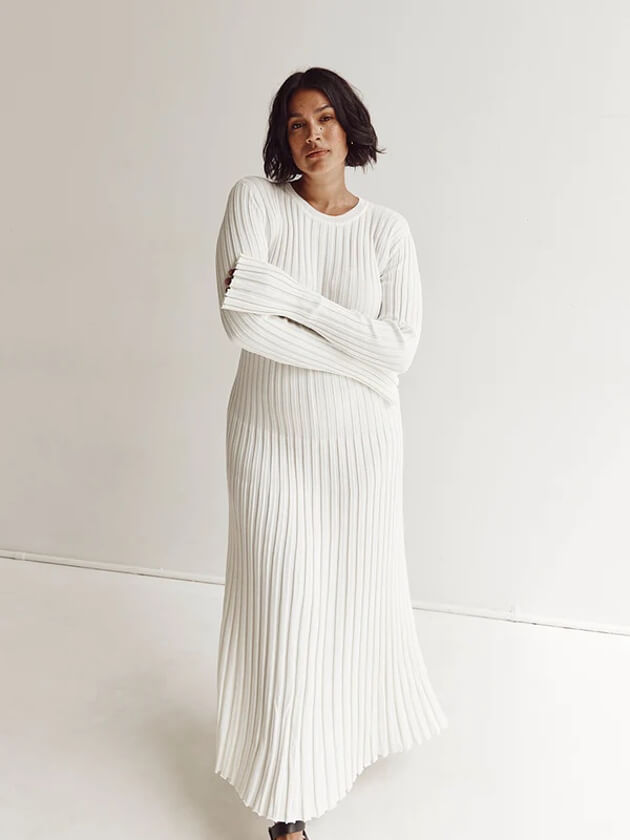 White ribbed knit maxi dress with a high round neckline