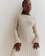 Beige ribbed knit maxi dress styled for the transitional season