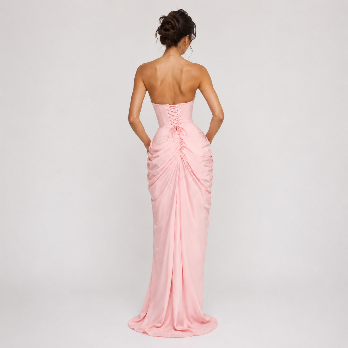 Maxi dress in Pink, showing the graceful draped skirt.
