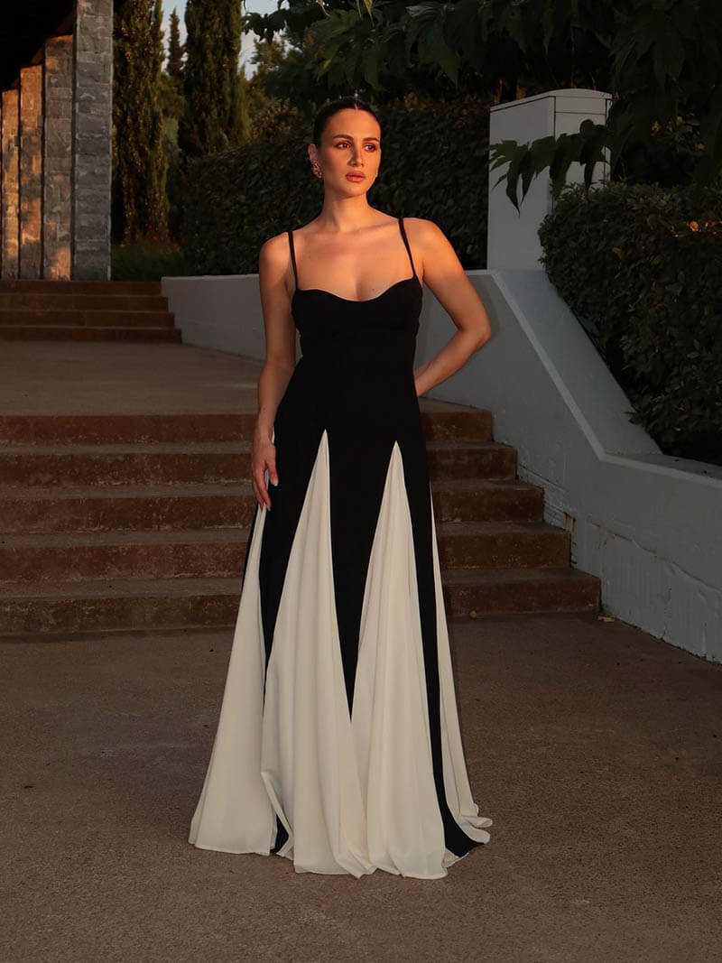 Maxi dress in Black and White, showing the dramatically paneled skirt.
