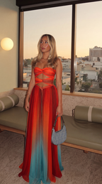 Multicolour ombre strapless maxi dress worn indoors at sunset