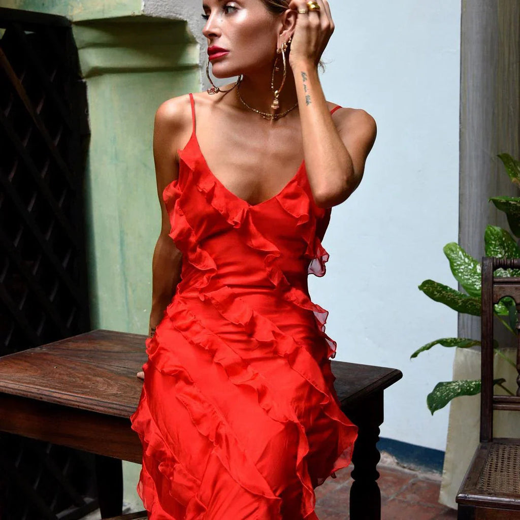 Red off-shoulder maxi dress styled for a wedding or garden party
