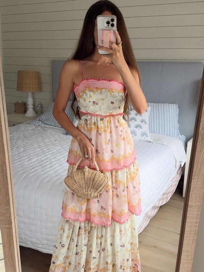 Pink tiered maxi dress with empire waist and adjustable straps