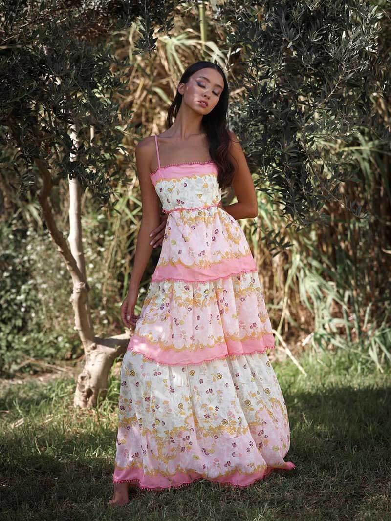 Pink maxi dress worn with concealed back zip, back view