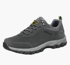 Men's waterproof hiking shoes in grey with cushioned sole and trail grip