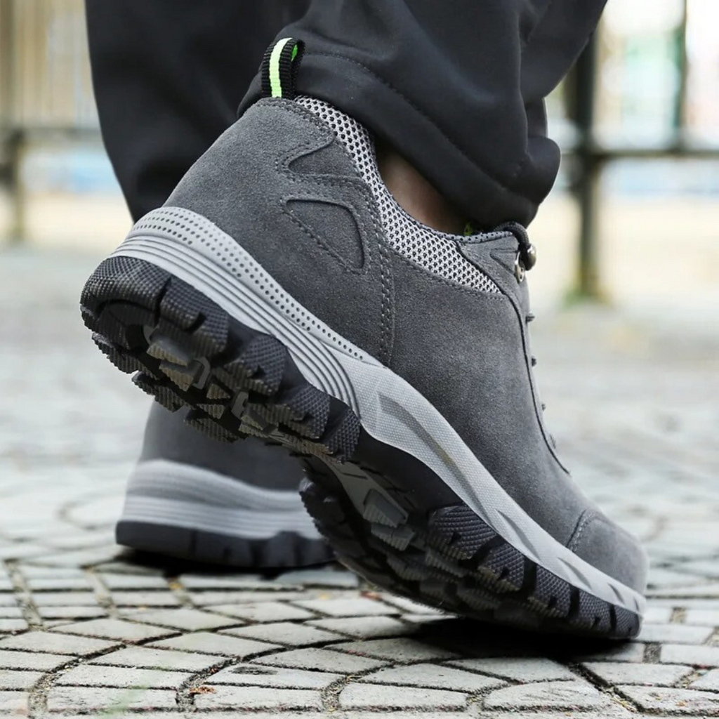 Men's waterproof hiking shoes in grey with cushioned sole and trail grip