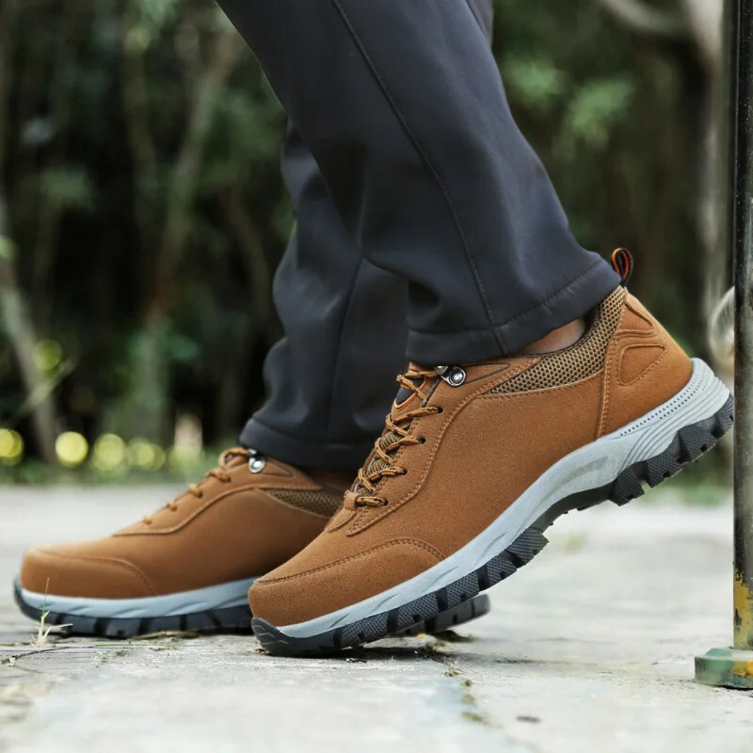 Men's waterproof hiking shoes in grey with cushioned sole and trail grip