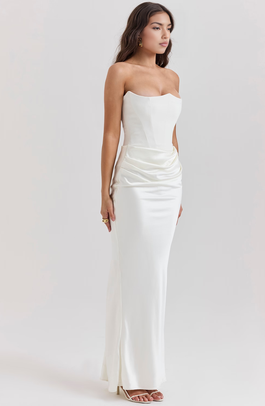 White corset maxi dress with strapless bodice and front draping
