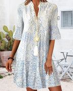 Women's blue midi dress flowing v-neck paisley