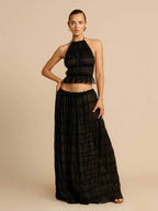 Black ruffle halter two-piece set, studio front view