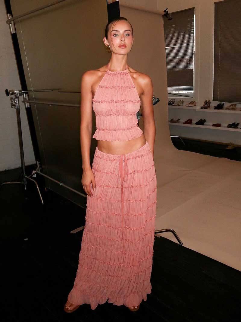 Pink ruffle halter two-piece set, studio shot