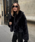 Black faux fur coat with wide lapels, front view