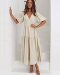 Front view of the Cream maxi dress, styled for an everyday transitional outfit