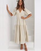 Front view of the Cream maxi dress, styled for an everyday transitional outfit