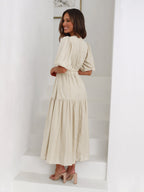 Side angle view of the White maxi dress highlighting the overall silhouette