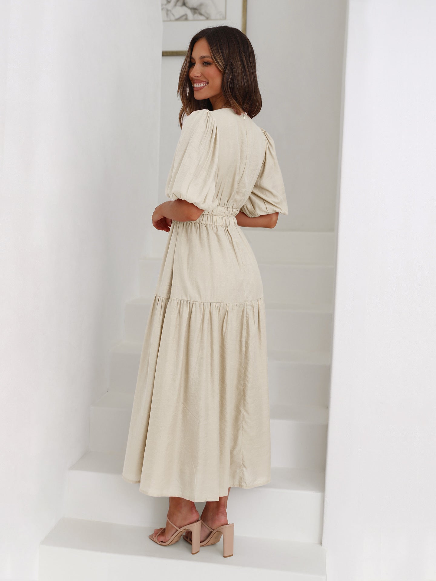Side angle view of the White maxi dress highlighting the overall silhouette