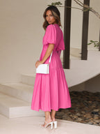 Full-length view of the Pink maxi dress worn from top to bottom