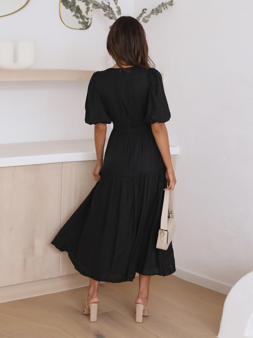 Close-up of the Cream maxi dress trim, finish and hardware detail