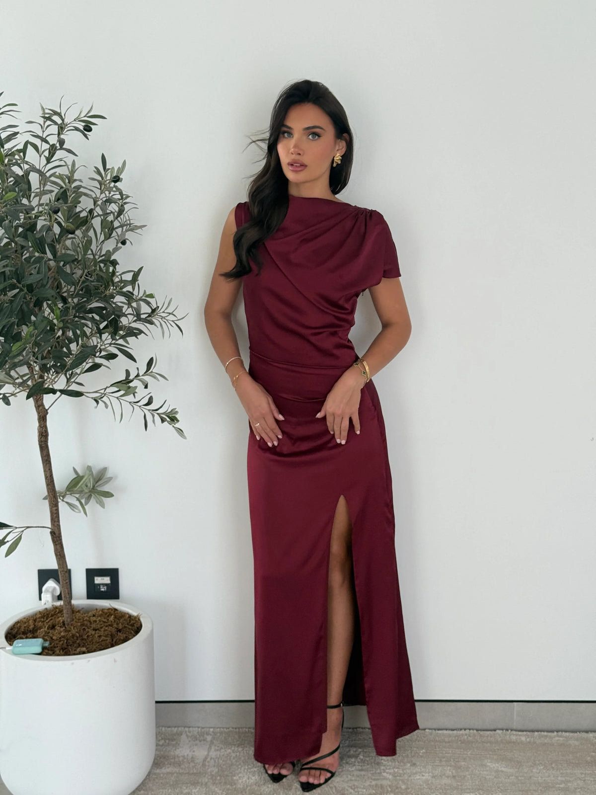 Wine red satin maxi dress with a draped neckline, front view