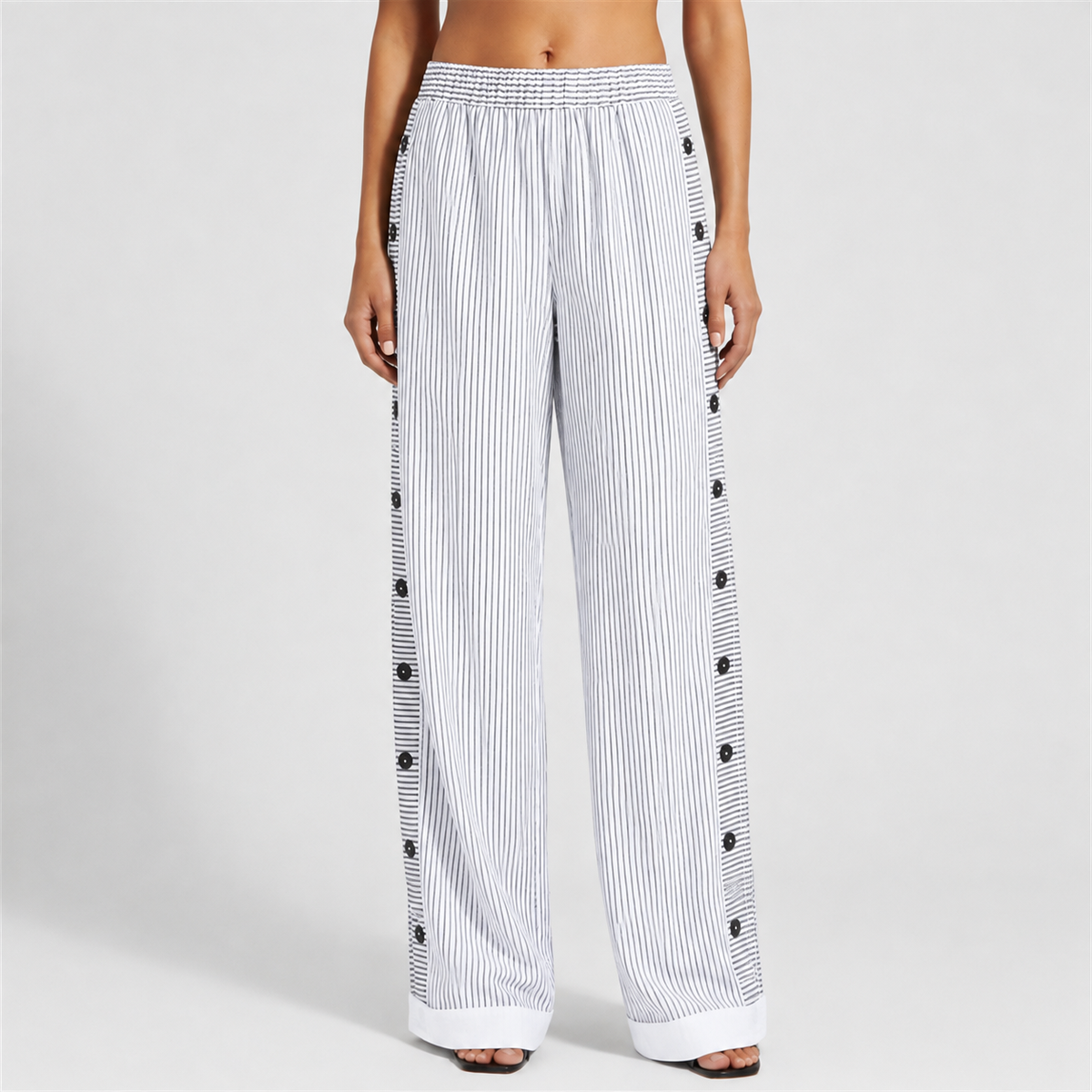 Off white striped trousers with button-accent seam detail