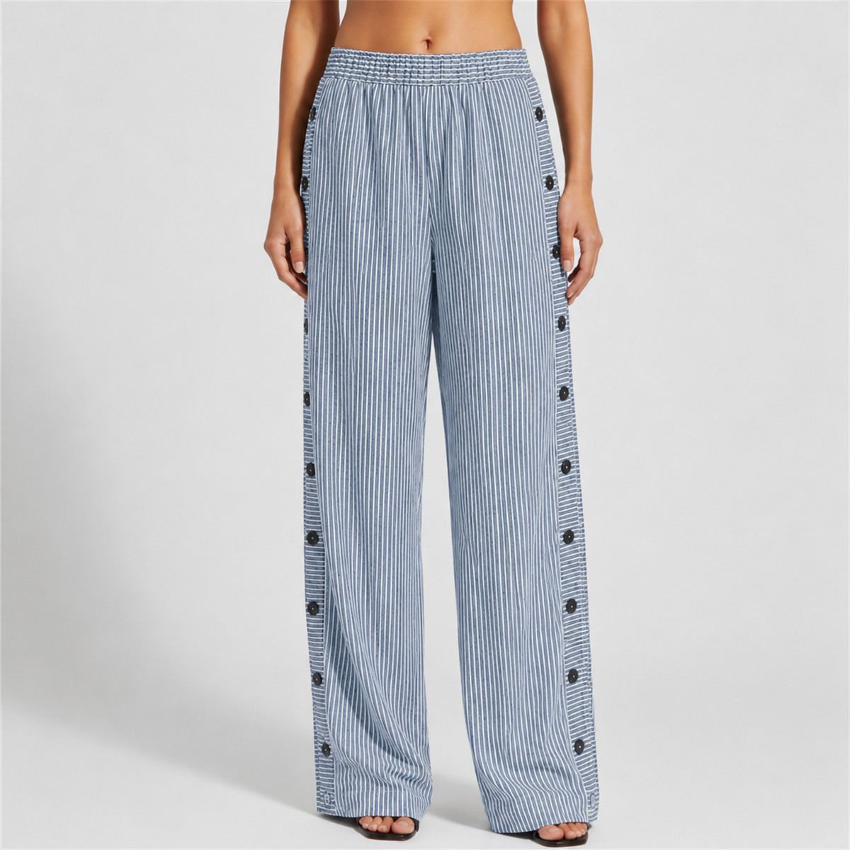 Light blue striped trousers with a tailored silhouette