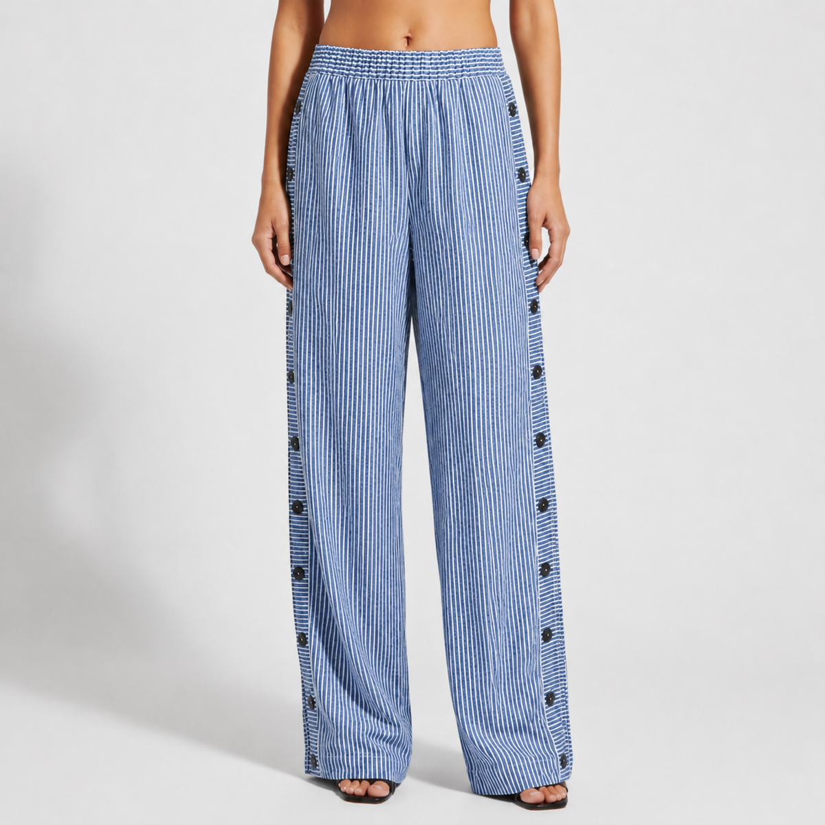 Royal blue striped trousers with button-accent seam detail