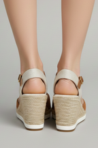 Black espadrille sandals styled with a casual everyday dress