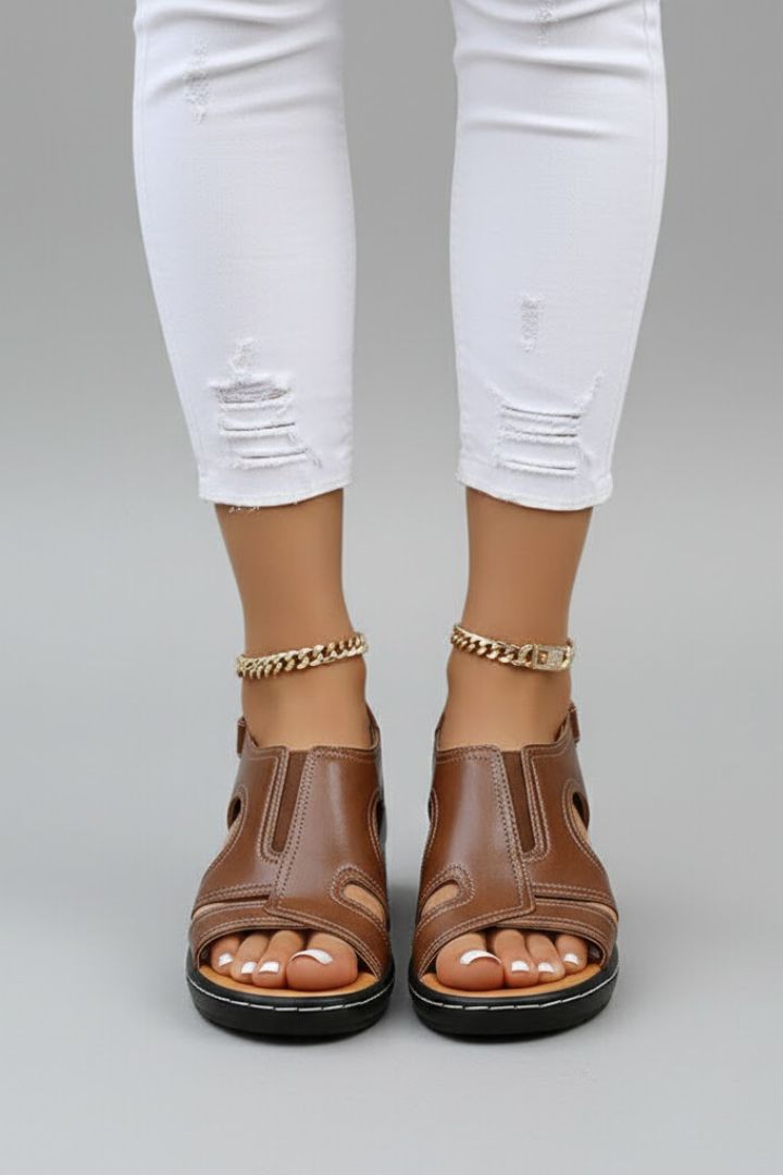 Close-up of brown platform sandals with adjustable ankle strap