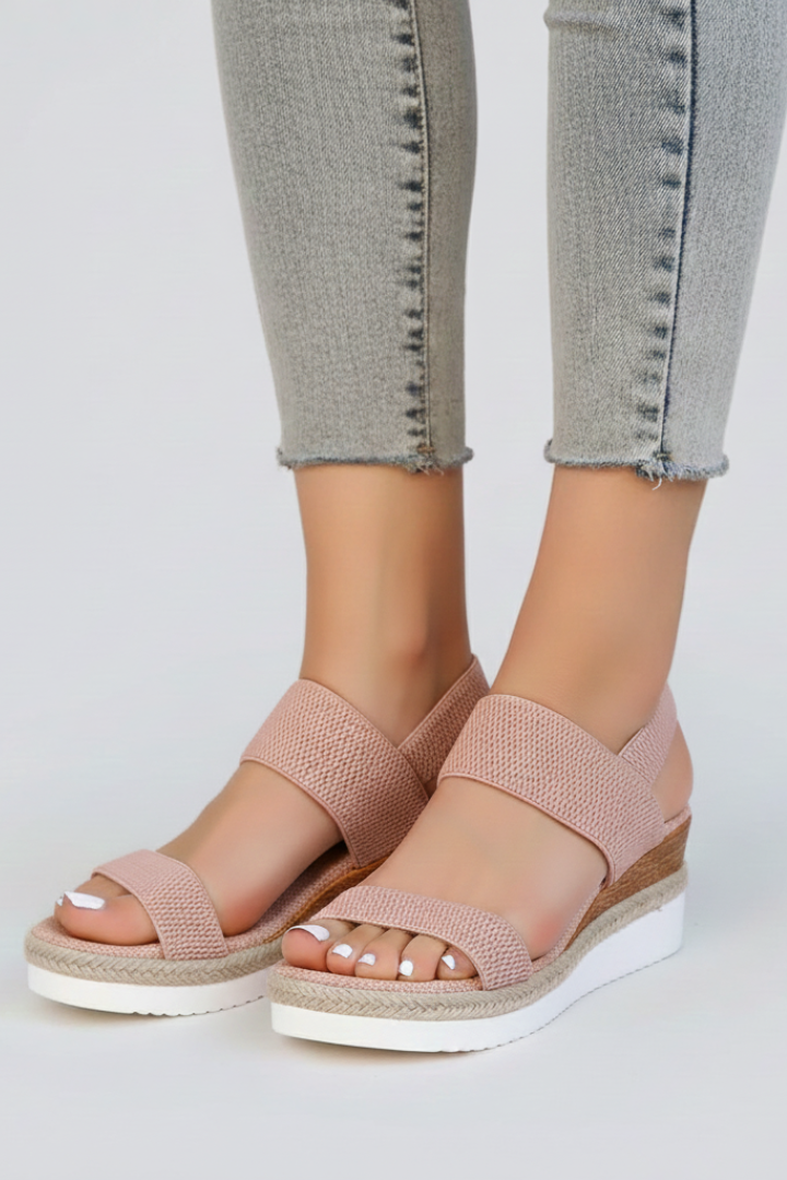 Front view of the Pink wedge sandals, styled for an everyday transitional outfit