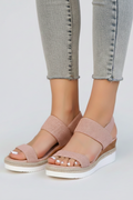 Front view of the Pink wedge sandals, styled for an everyday transitional outfit