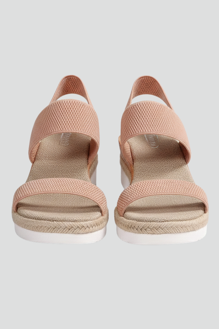 Close-up of the Black wedge sandals showing the fabric texture and finish in detail