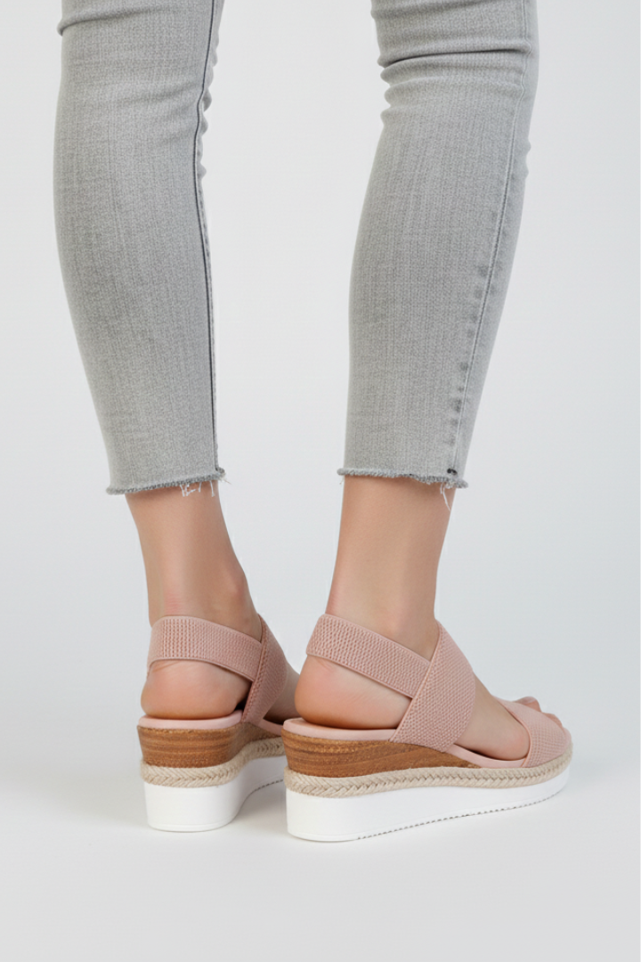 Side angle view of the Brown wedge sandals highlighting the overall silhouette