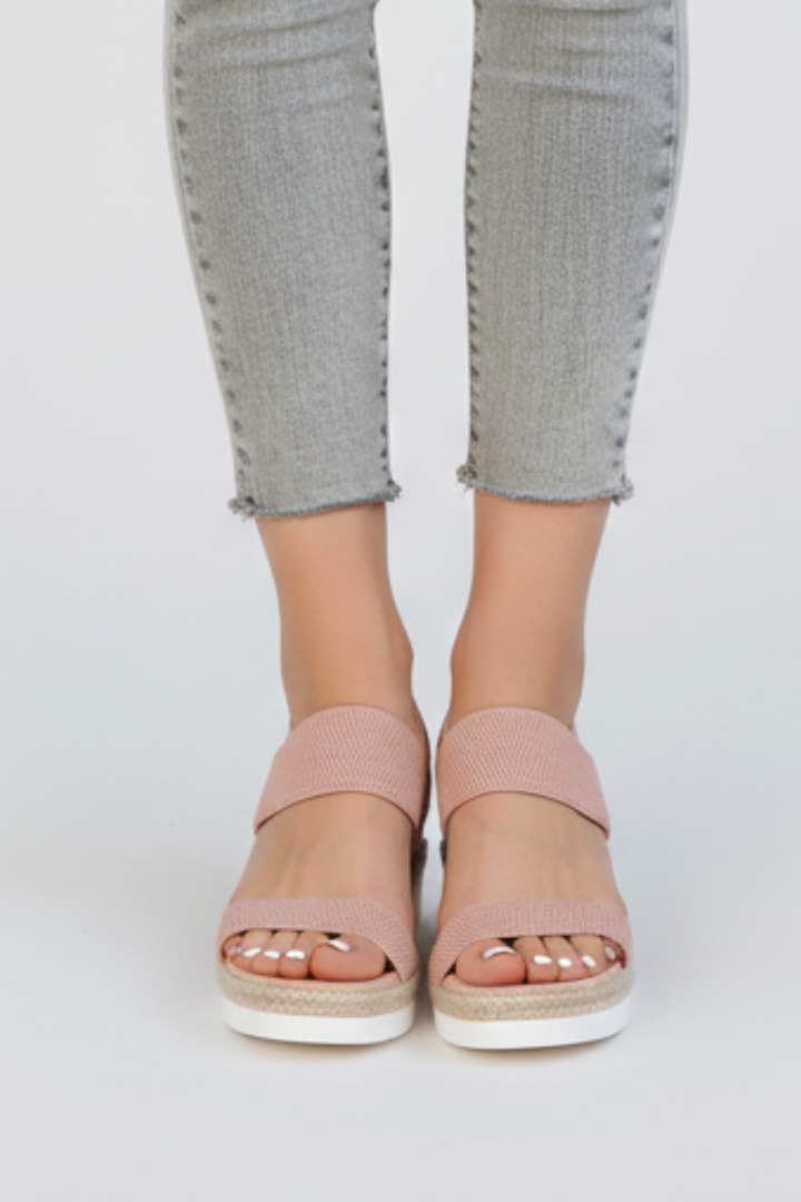 The Grey wedge sandals photographed from a different angle to show the fit