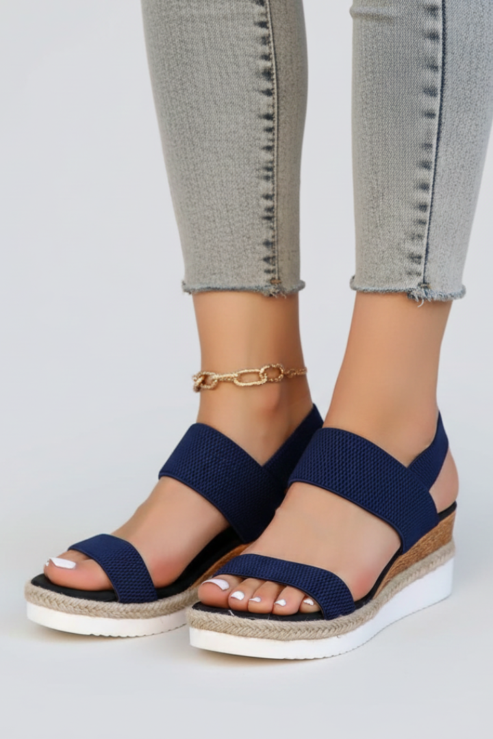 Full-length view of the Pink wedge sandals worn from top to bottom