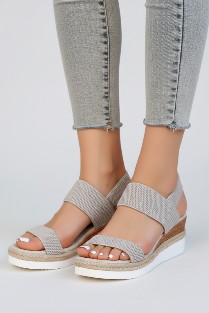 Close-up of the Brown wedge sandals trim, finish and hardware detail