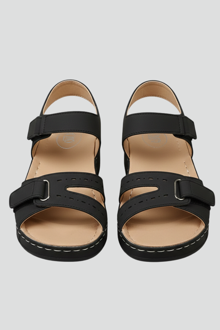 Black wedge sandals with adjustable hook-and-loop straps, product view