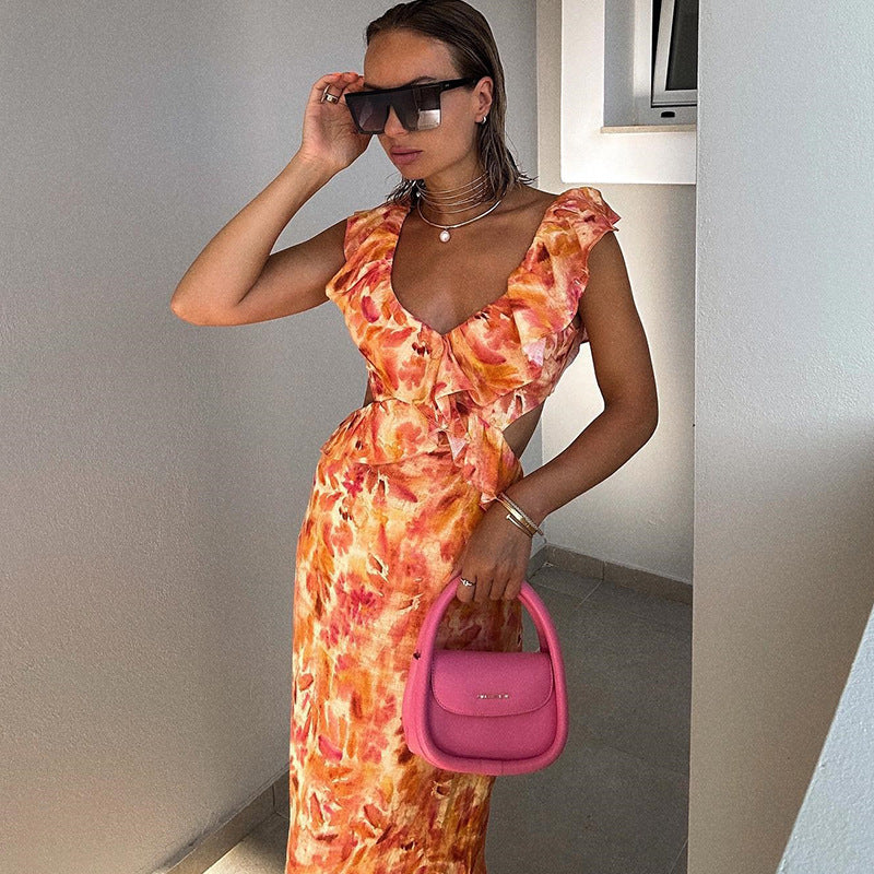 Orange floral maxi dress styled for a garden party or brunch