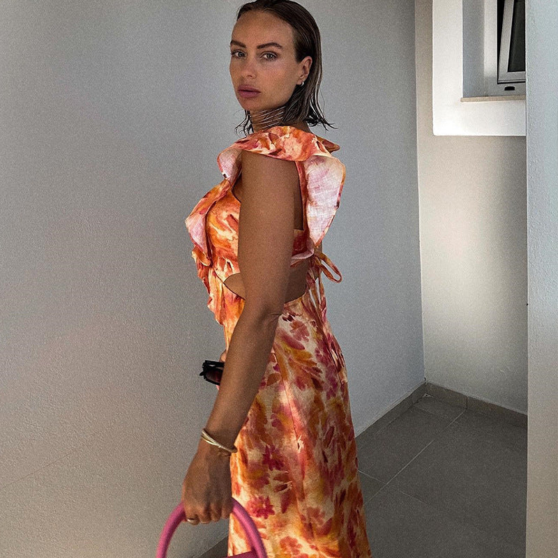 Orange floral maxi dress in a lightweight, breathable fabric